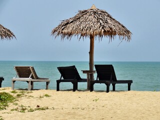 Empty deck chairs on beach because of covid-19