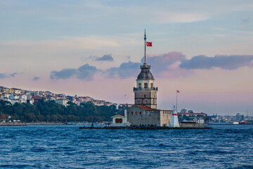 Fototapeta na wymiar Island of Maiden's Tower, probably most known lighthouse of Bosphorus strait in Istanbul, Turkey. It's very popular among tourists & legend lovers. It's one of famous Stambul symbols