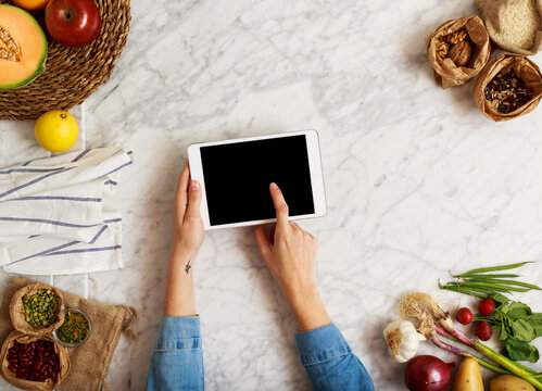 Woman using device, health and tech concept.