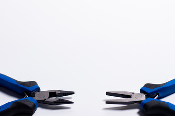 A set of two different types of side cutters.