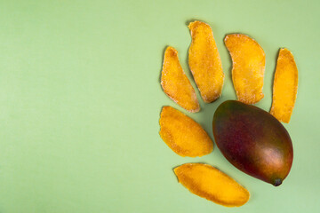 dried mango on a white green table from the top view