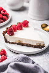 Homemade cheesecake with fresh raspberries. Delicious cheese cake with berries, healthy organic summer dessert pie