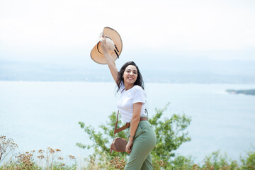 Fototapeta premium traveler woman in lake background