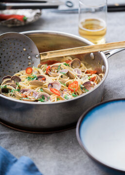 Spaghetti with clams,tomato and garlic.