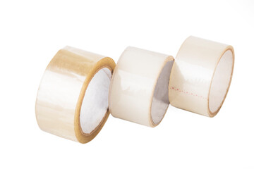 Transparent adhesive tape on a white background. One lighter second yellow. Close-up. isolate.