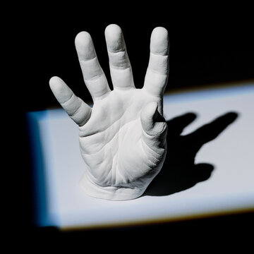 Hand cast in the spot light