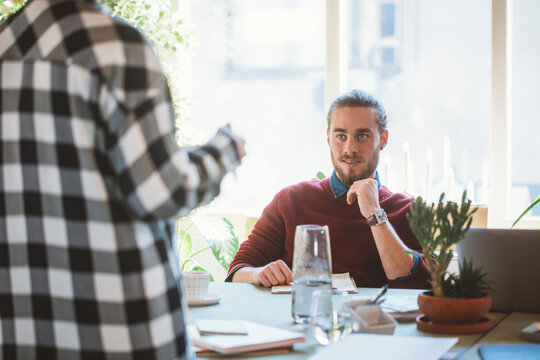 Businessman Talking With His Co-Worker