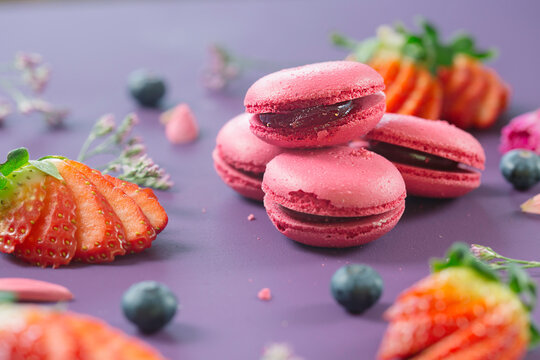 Strawberry and blackberry macarons