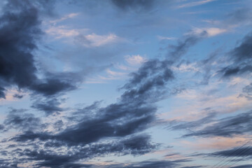 Naklejka na ściany i meble Blue clouds at sunset