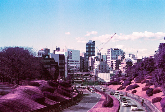 Road leading to city skyscrapers in the distance