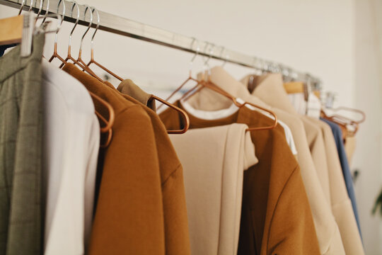A row of clothes hanging on the rack
