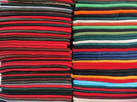 Multi-colored cloths stacked