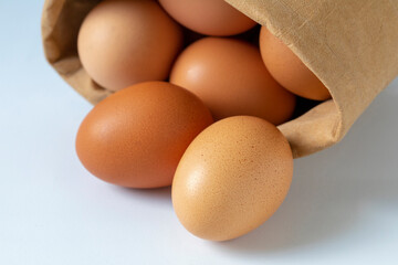 Fresh eggs, packed in kraft paper bags