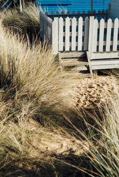 Gate and fench on a beach hut at Old Hunstanton, Norfolk, UK.