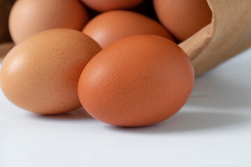 Fresh eggs, packed in kraft paper bags