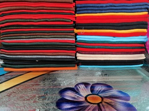 Multi-colored cloths stacked
