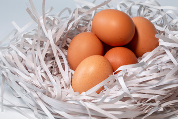 Put the eggs in a cushion shaped like a bird’s nest