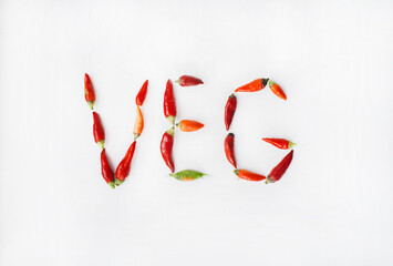 concept of eco and vegan lifestyle presented by the word veg made from the chili peppers