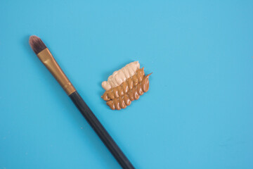 Make up elements on a table with make up all around