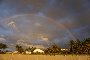 Fototapeta na wymiar colorful rainbow above the beach in La Réunion, France