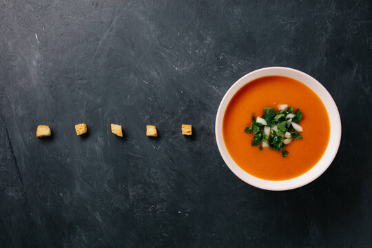 Crunchy bread and tomato soup