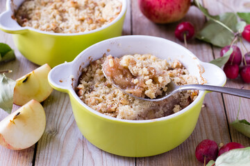 Apple crumble on wooden table