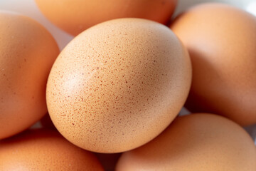 Eggs in a white magnetic bowl