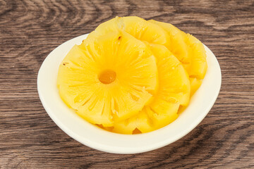 Marinated pineapple rings in the bowl