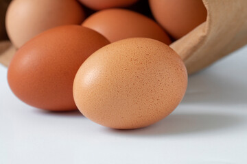 Fresh eggs, packed in kraft paper bags