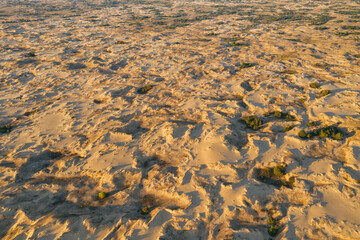 Desert sunset. Beautiful desert with warm colors. Top view Аleshkovskaya desert in Ukraine