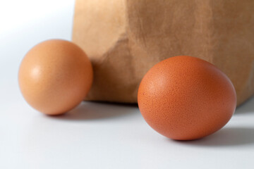 Fresh eggs, packed in kraft paper bags
