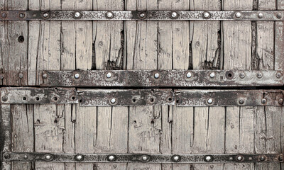 old planks, rivets and rusty iron. Vintage background
