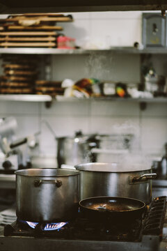 Copper pots on stove