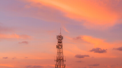 Telecommunication mast TV antennas in the afternoon ,on the hill sunset sky with cloud bright at Phuket Thailand.