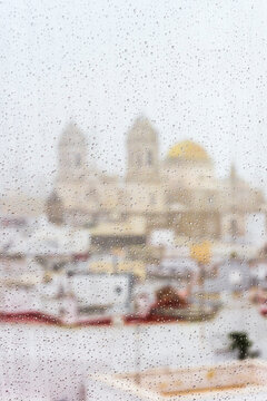Cadiz Cathedral through the wet window