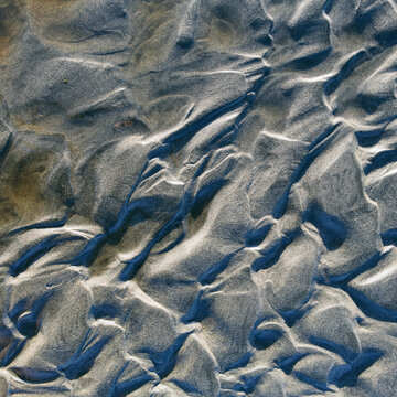 Detail of patterns in sand at low tide