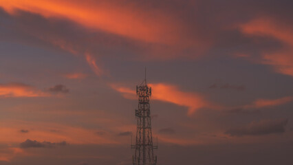 Telecommunication mast TV antennas in the afternoon ,on the hill sunset sky with cloud bright at Phuket Thailand.