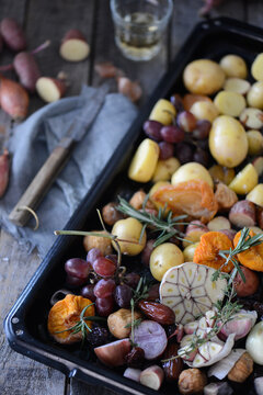 Potatoes, onion, garlic prepared to be roasted