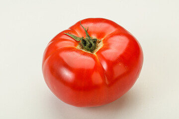 Ripe big juicy red tomato