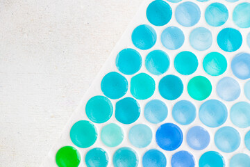 Colorful honeycomb background, green and blue colors gradient in circles