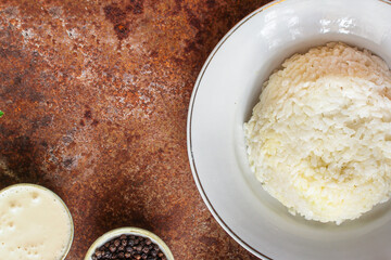 rice in a plate garnish on the table serving size top view place copy space for text keto or paleo diet