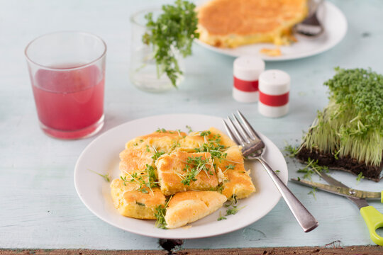 Shredded cheese pancake with cress