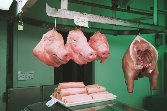 Three pig heads and one hindquarter