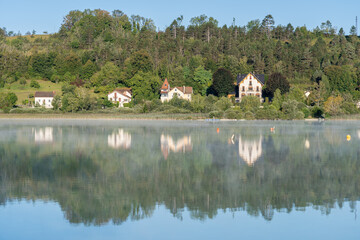 Clairvaux-Les-Lacs, France - 09 01 2020: Reflections on the big lake - La Raillette