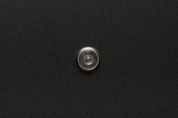 Door lens peephole on the entrance metal door, centered, copy space. Personal safety. - obrazy, fototapety, plakaty