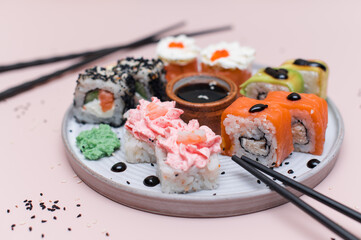 Sushi set on pink background