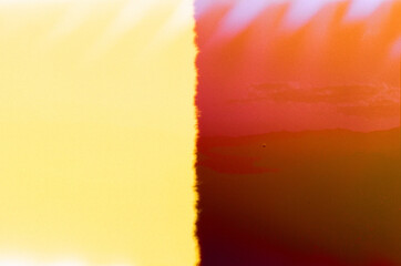 film burn of light and dark orange