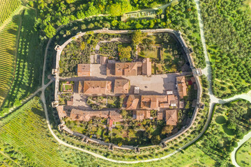 vertical aerial view of the medieval town of monteriggioni tuscany italy