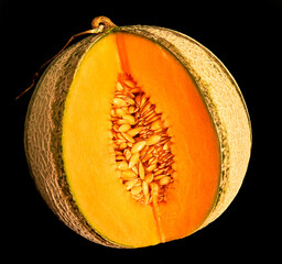 melon lies on a black background