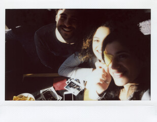 Smiling friends with taco.